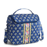 Blue floral-patterned bag with a colorful stripe on a white background