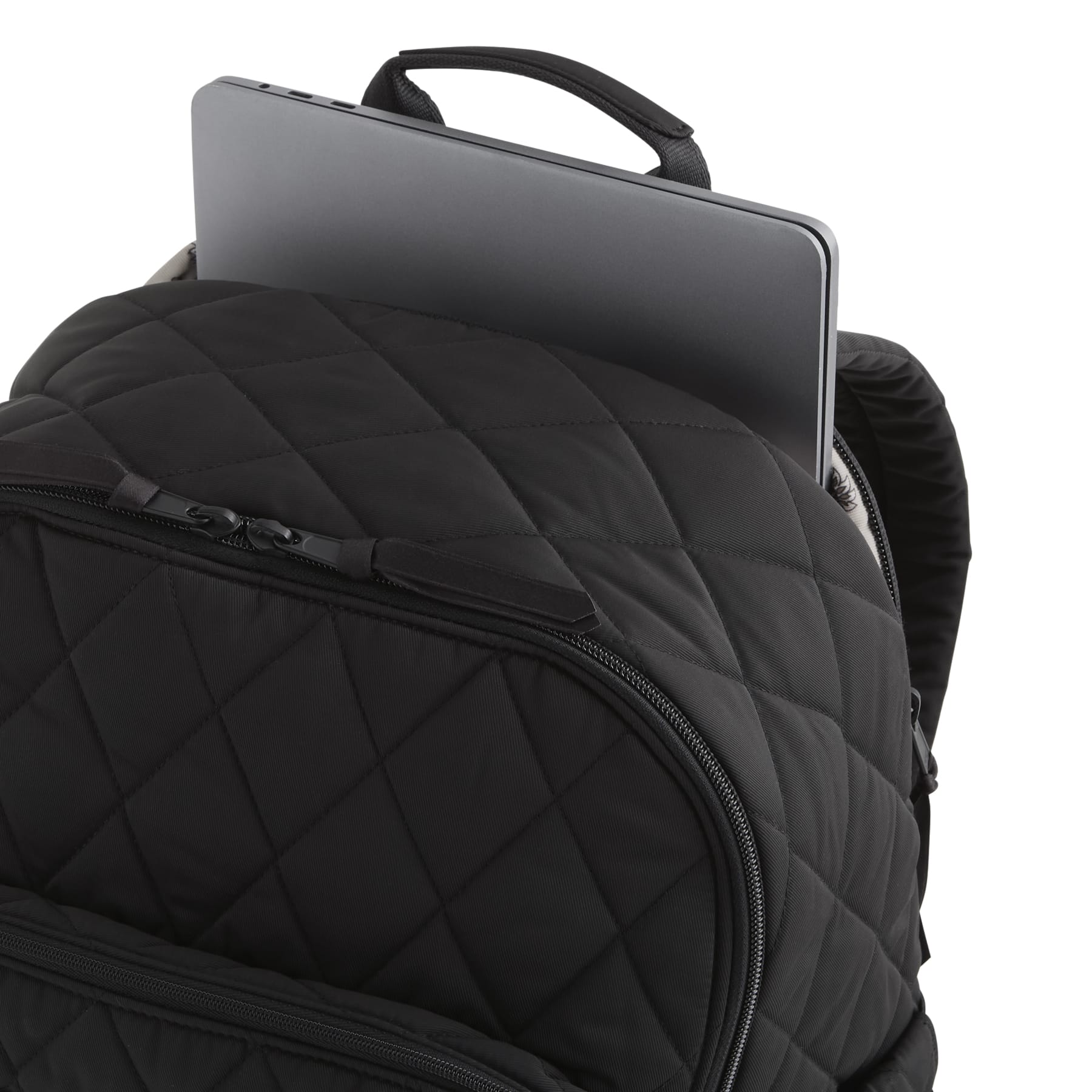 Black quilted backpack with a laptop compartment on a white background