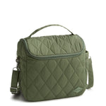 Green quilted bag with a strap on a white background